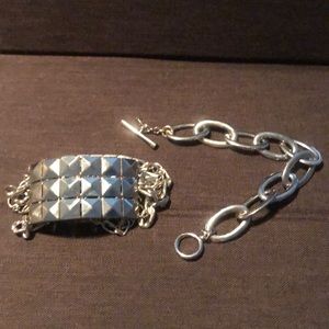 Two silver rock ‘n’ roll bracelets